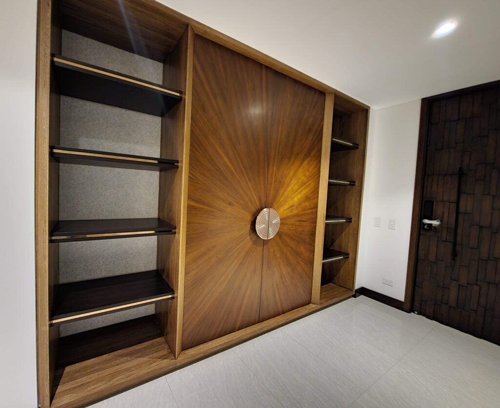 Luxury solid wood entryway built-in cabinet with imported brass hardware by Alterra Craft in Tucson